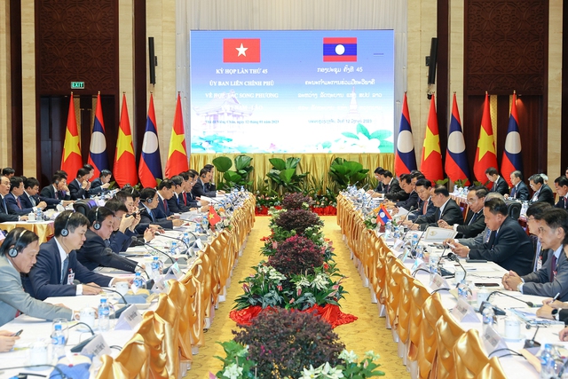 Description: Việt Nam-Lào tăng cường kết nối, hỗ trợ nhau xây dựng nền kinh tế độc lập, tự chủ - Ảnh 1.